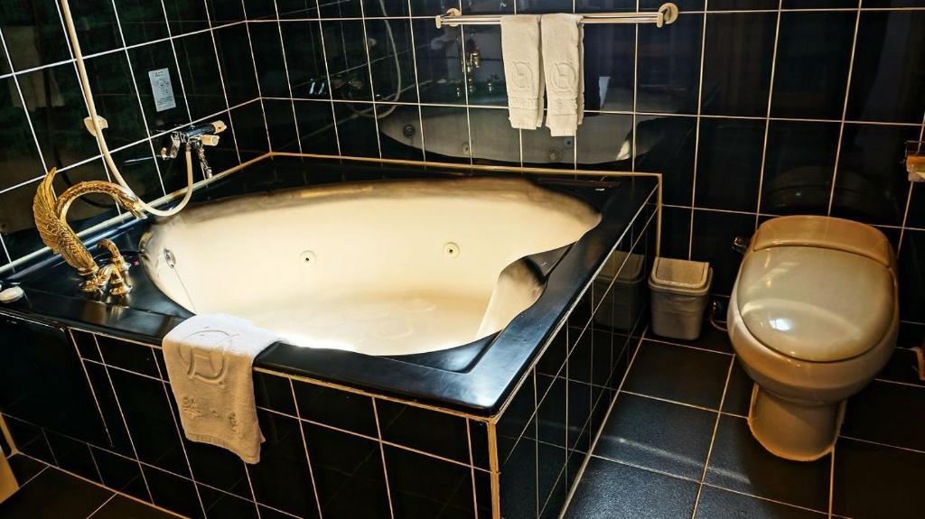 Hwa Du Hotel Тайнан Стая снимка